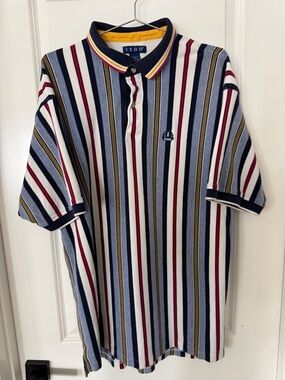Izod Striped Polo Shirt in Navy, White, Light Blue & Red